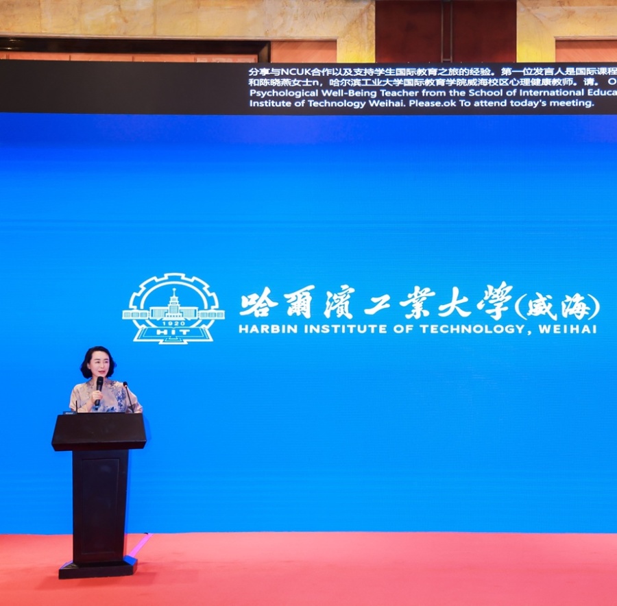 Xiaoyan Chen speaking at the event